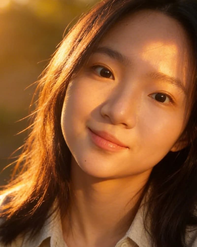 Warm professional headshot generated from the first source selfie.